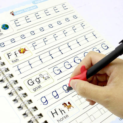 Handwriting practice book with letters E, F, G, and H being written by a hand holding a pen.