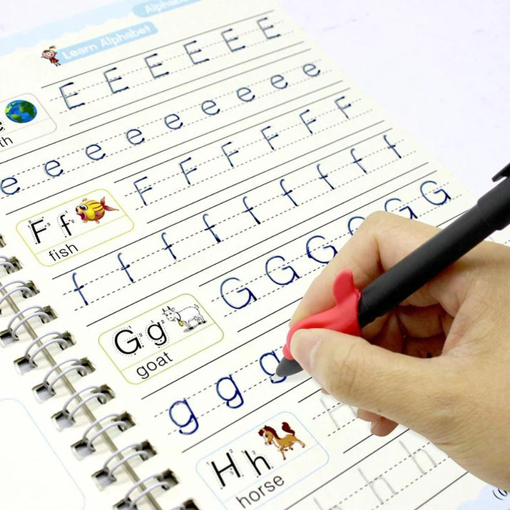 Handwriting practice book with letters E, F, G, and H being written by a hand holding a pen.